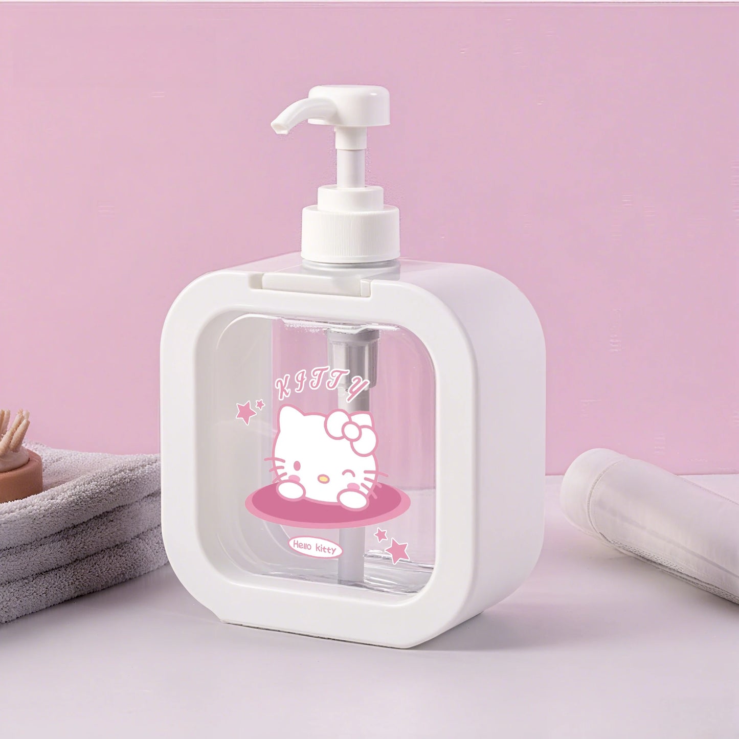 White soap dispenser with cartoon character on a pink background