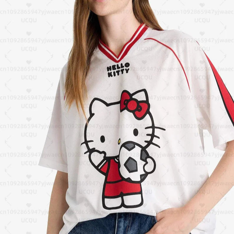 Woman wearing a Hello Kitty sports jersey with a white background