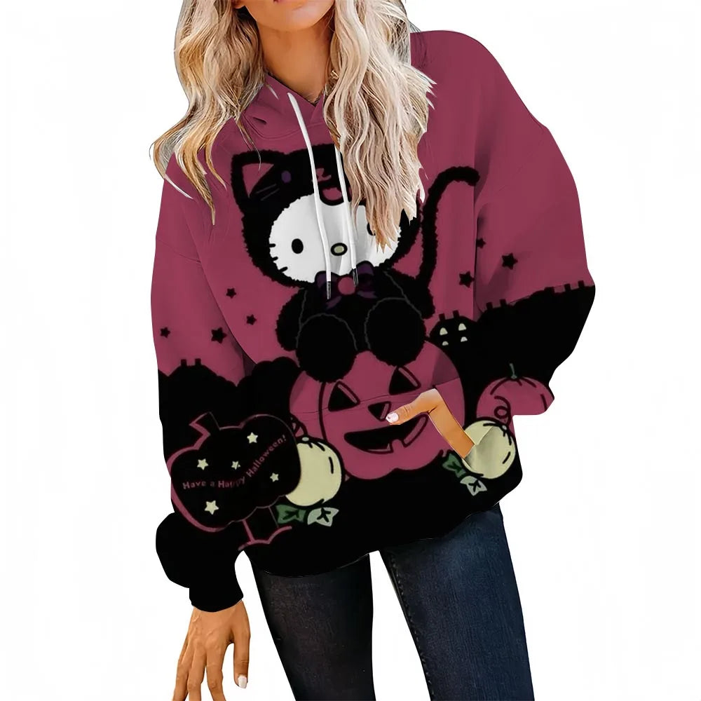 Halloween-themed hoodie with cat and pumpkin design on a white background