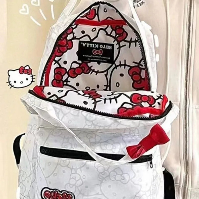 Hello Kitty shark-themed backpack with red bows on a beige background