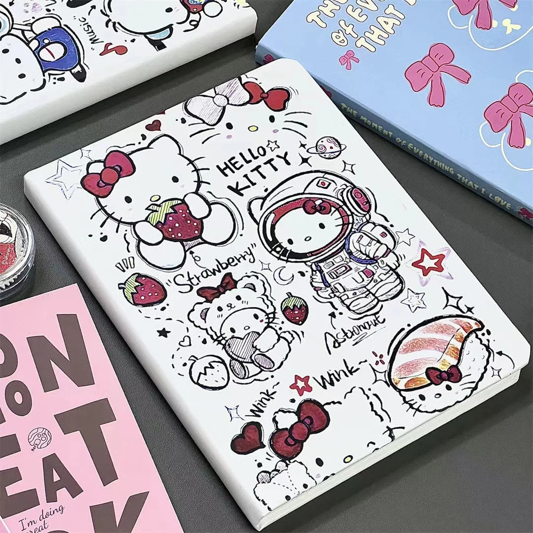 Notebook with Hello Kitty design on a gray surface