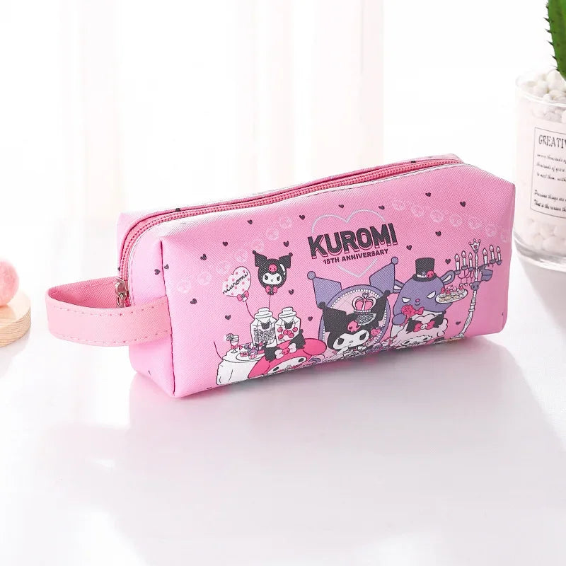 Pink pencil case with cartoon character designs on a white surface