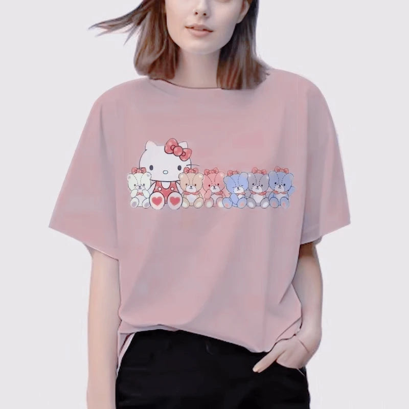 Person wearing a pink t-shirt with cartoon character design on a plain background