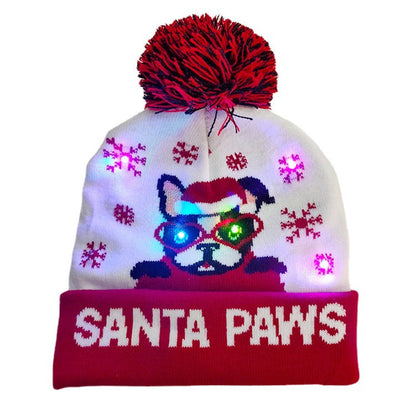 Bonnet de Noël tricoté avec boule de fourrure