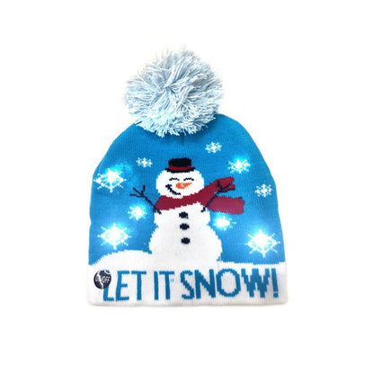 Bonnet de Noël tricoté avec boule de fourrure