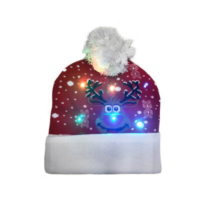 Bonnet de Noël tricoté avec boule de fourrure