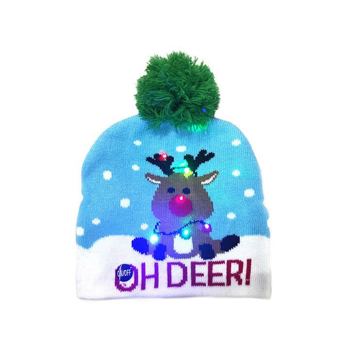 Bonnet de Noël tricoté avec boule de fourrure