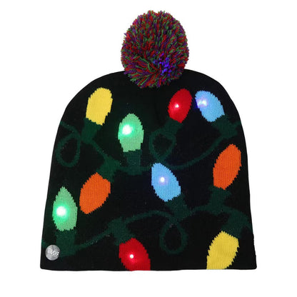 Bonnet de Noël tricoté avec boule de fourrure