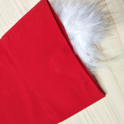 Bas de Noël à long nœud rouge