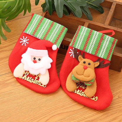 Sac de Noël avec chaussettes dorées