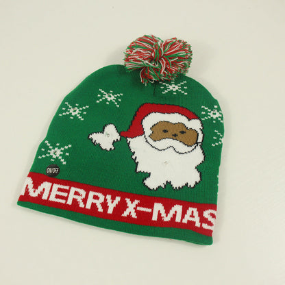 Bonnet de Noël tricoté avec boule de fourrure