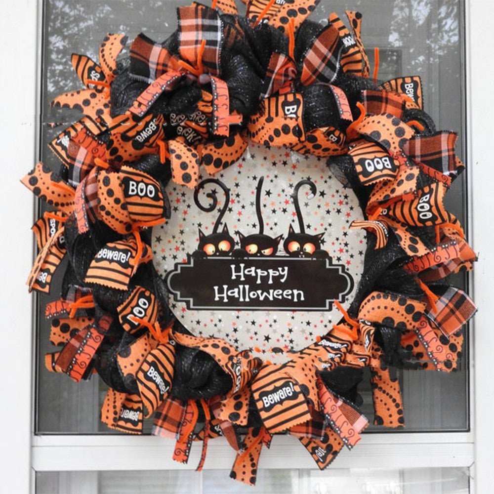 Couronne de citrouilles d'Halloween avec chat noir
