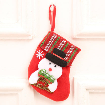 Sac de Noël avec chaussettes dorées