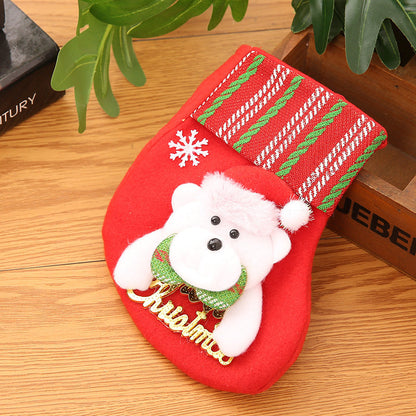 Sac de Noël avec chaussettes dorées