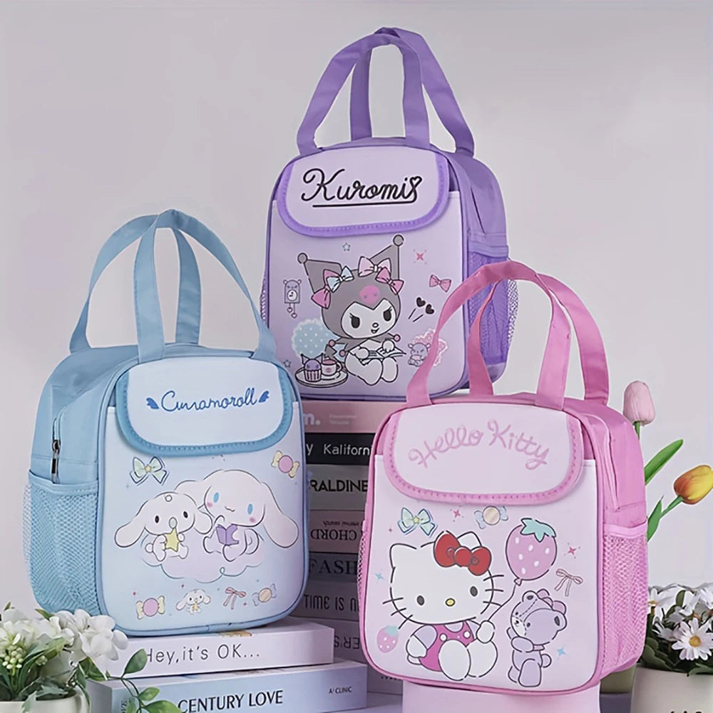 Three cartoon-themed lunch bags on a light gray background