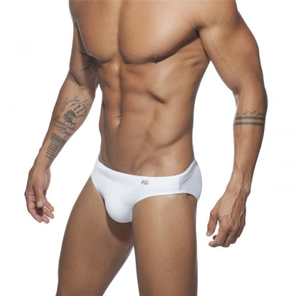 Man wearing a white underwear on a white background