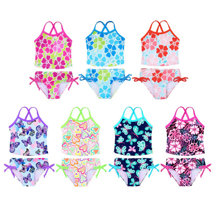 Set of colorful girls' swimsuits with various patterns on a white background