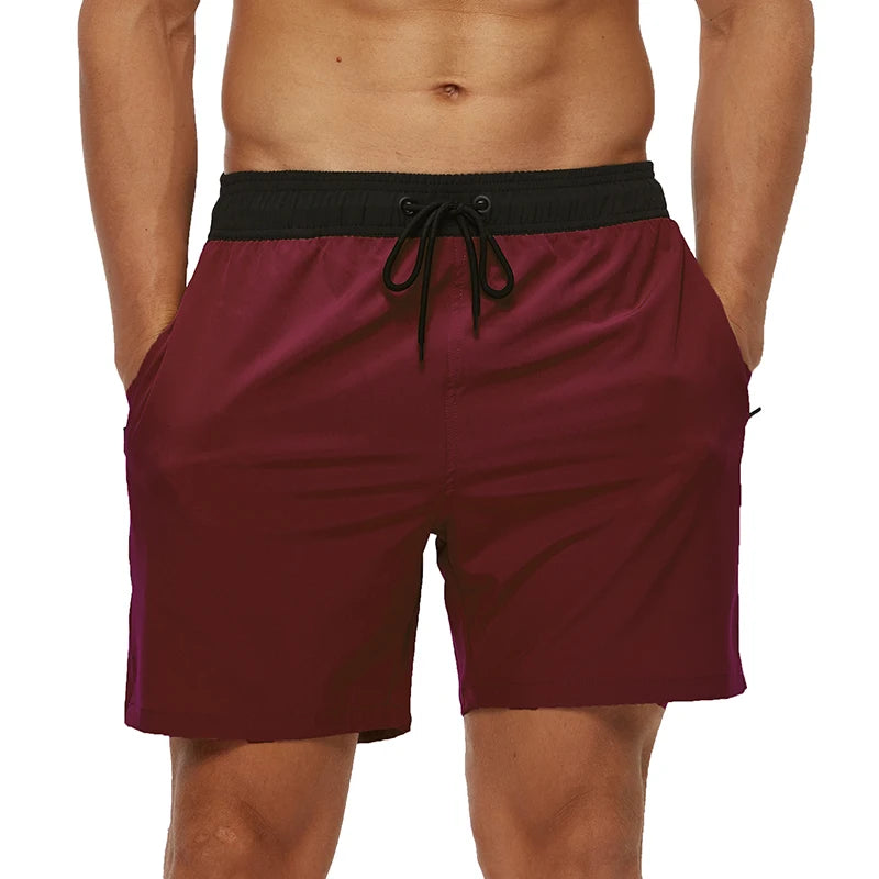 Wine shorts with a Black waistband worn by a person on a white background