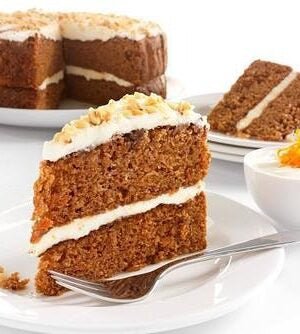 Round Gluten-Free Cream Cheese Frosting and Sprinkled Hazelnut Carrot Cake