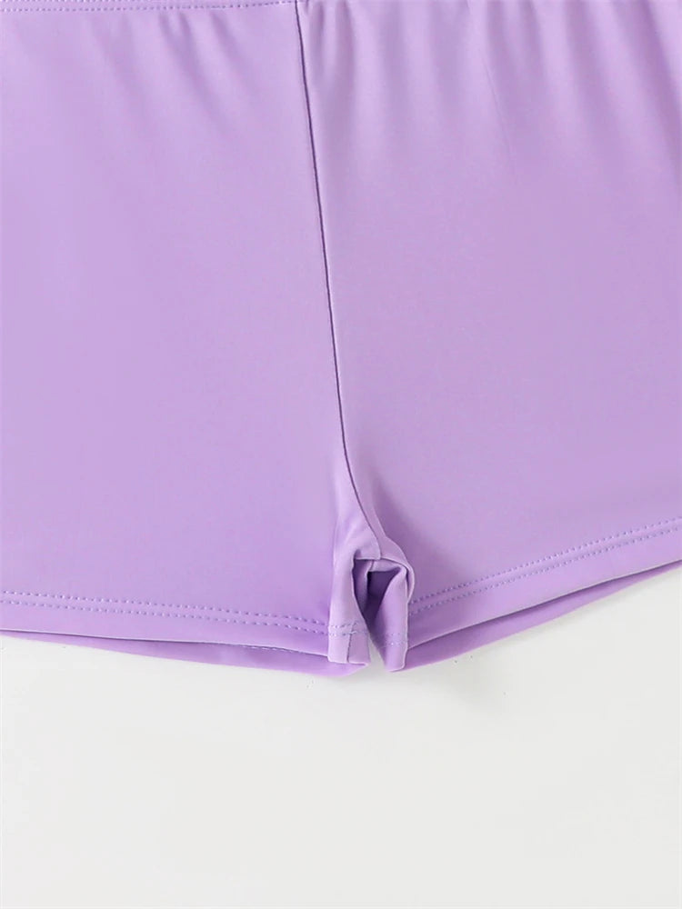 Close-up of a purple fabric with a white background