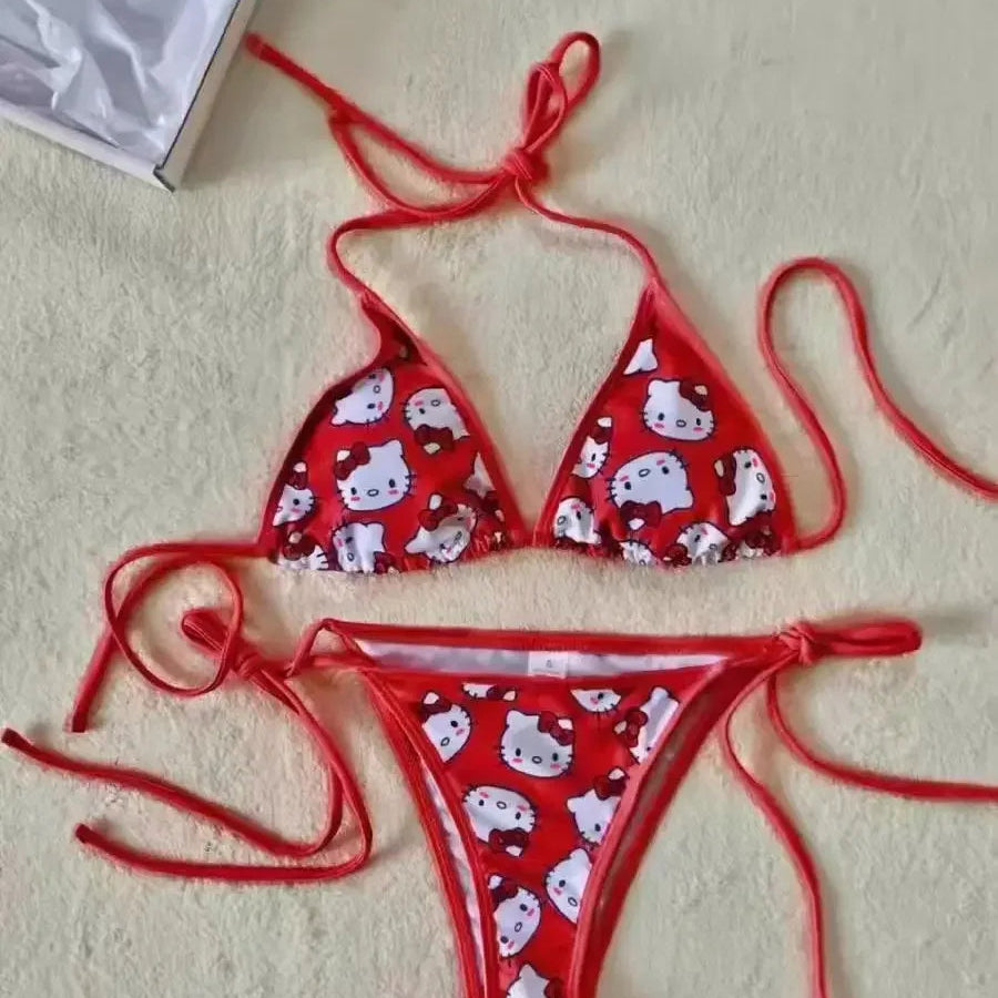 Red bikini set with white pattern on a beige surface