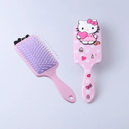 Two pink hairbrushes, one with a textured head and the other featuring a cartoon character, on a light purple background.
