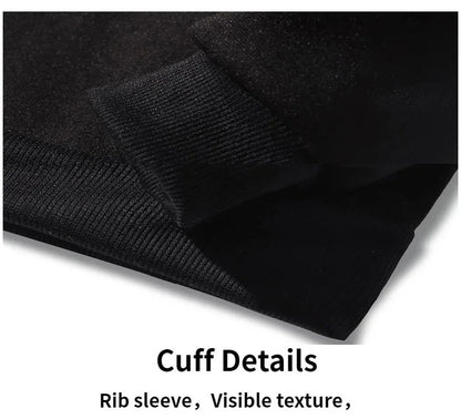 Close-up of a black ribbed sleeve with visible texture on a white background.