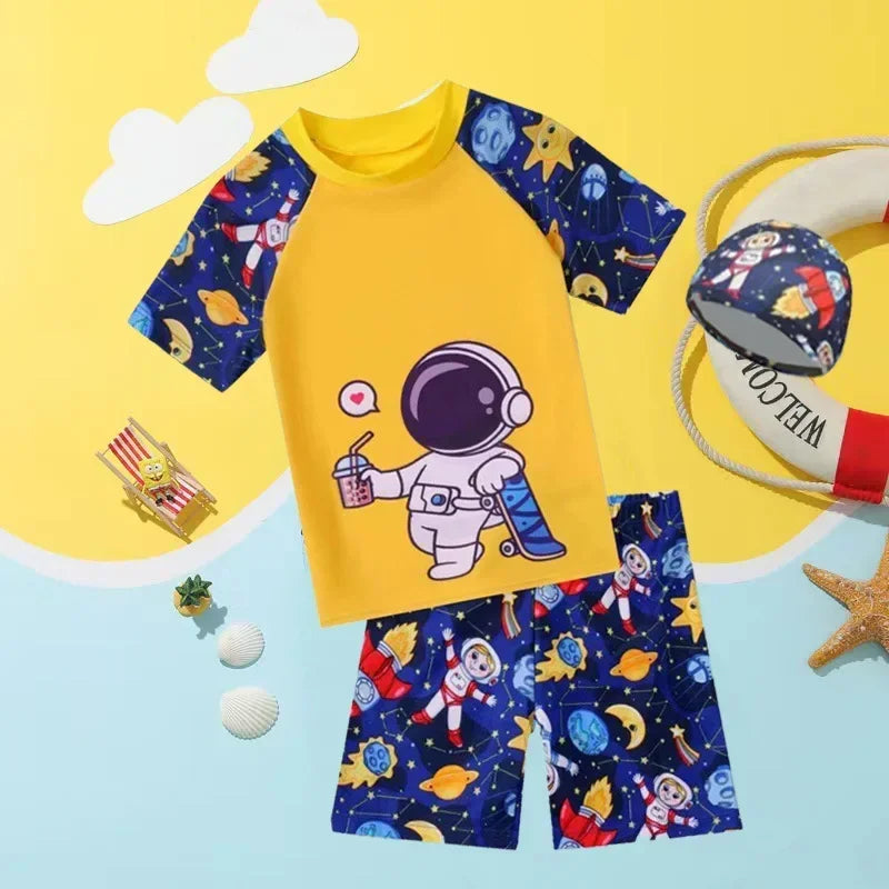 Children's swimsuit set with astronaut design on a yellow background