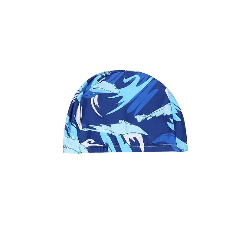 Blue swim cap with dolphin pattern on a white background