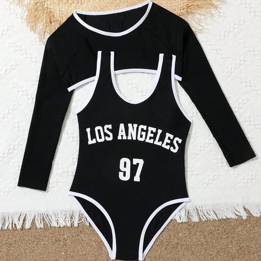 Black swimsuit with 'Los Angeles 97' text on a textured surface