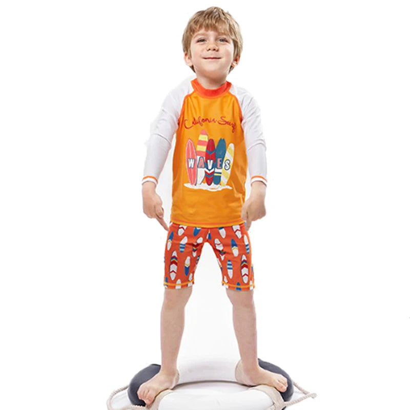 Child wearing a colorful outfit with a surfboard design on a white background