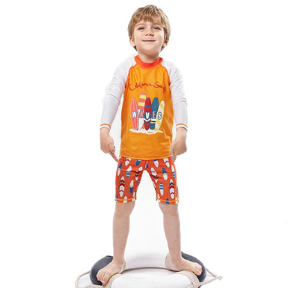 Child wearing a colorful outfit with a surfboard design on a white background