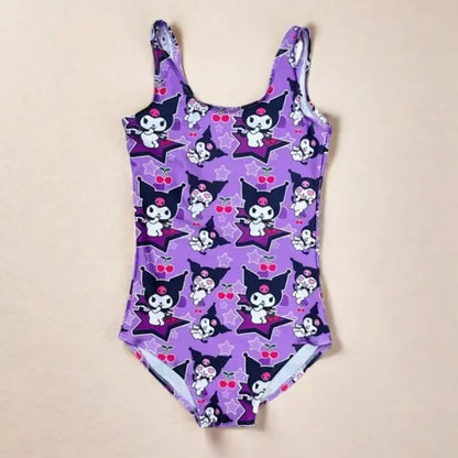 Purple swimsuit with cartoon character pattern on a beige background