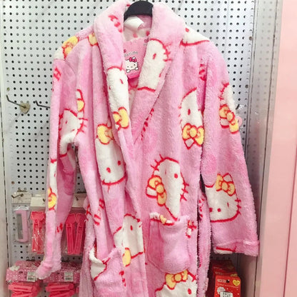 Pink Hello Kitty robe on a mannequin against a store display background