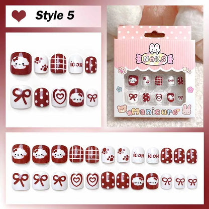 Set of nail art designs with packaging labeled 'Nails Manicure' on a pink background.