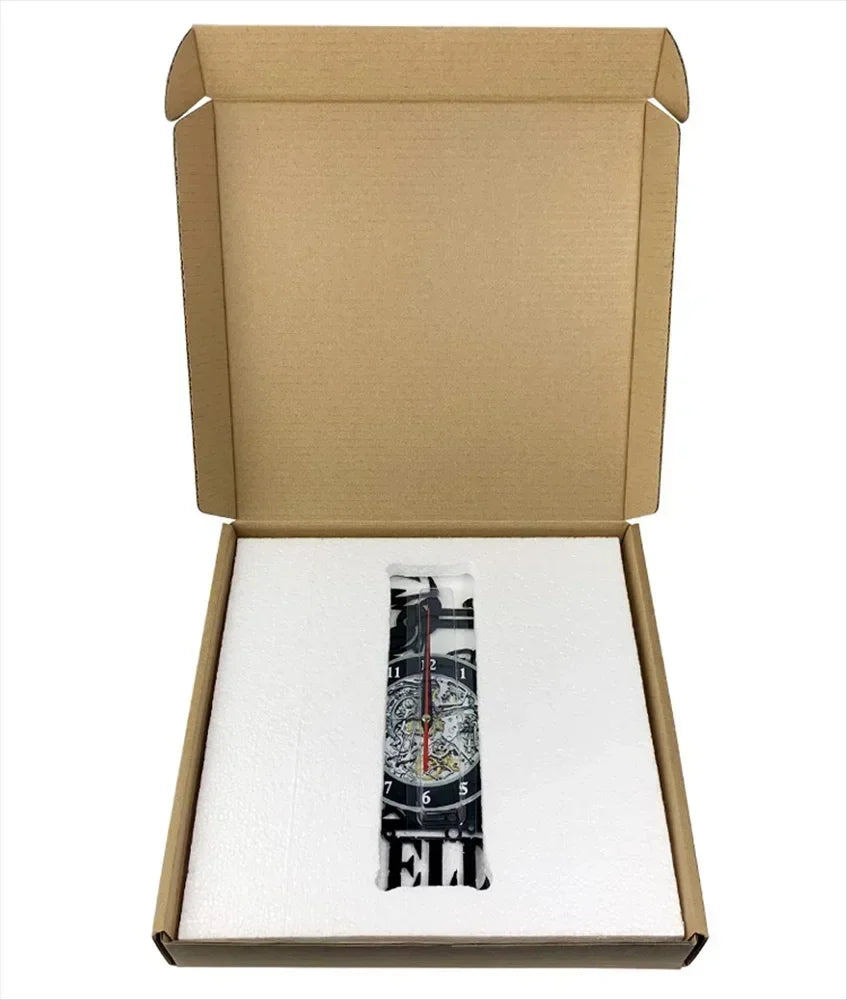 Watch inside an open wall clock box on a white background