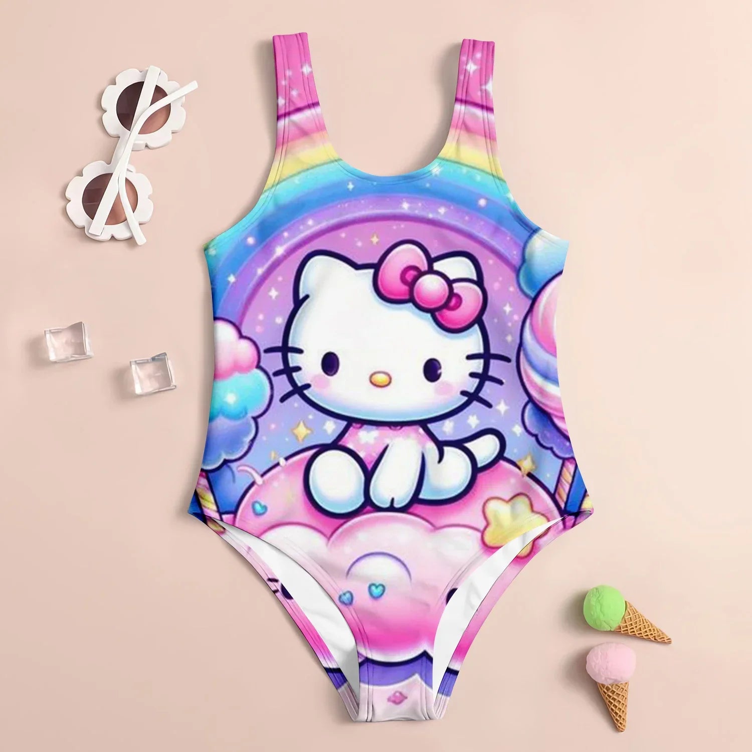Colorful swimsuit with Hello Kitty design on a beige background