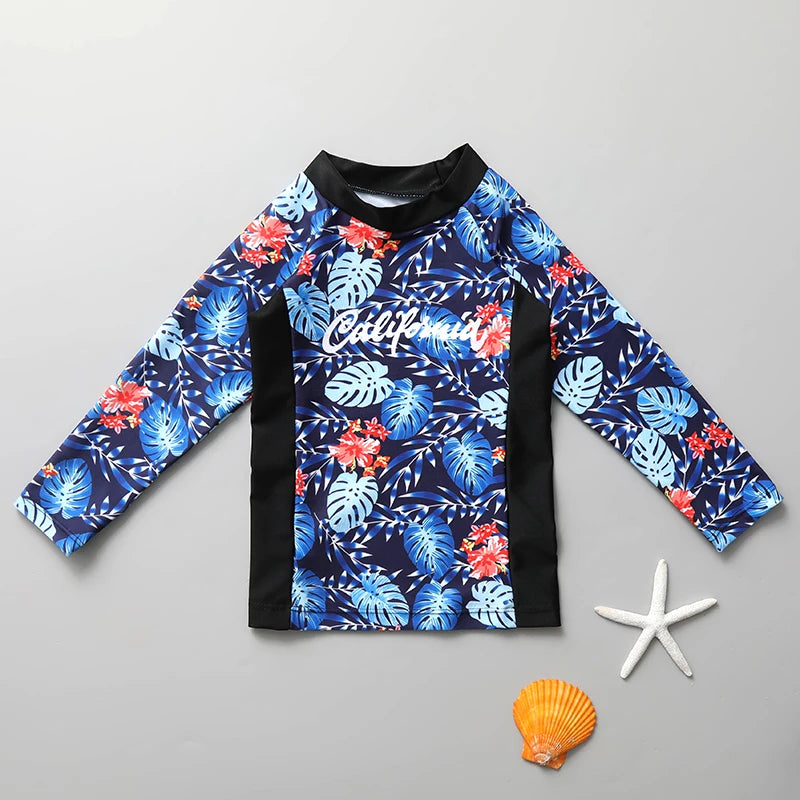 Children's long-sleeve shirt with floral pattern on a gray background
