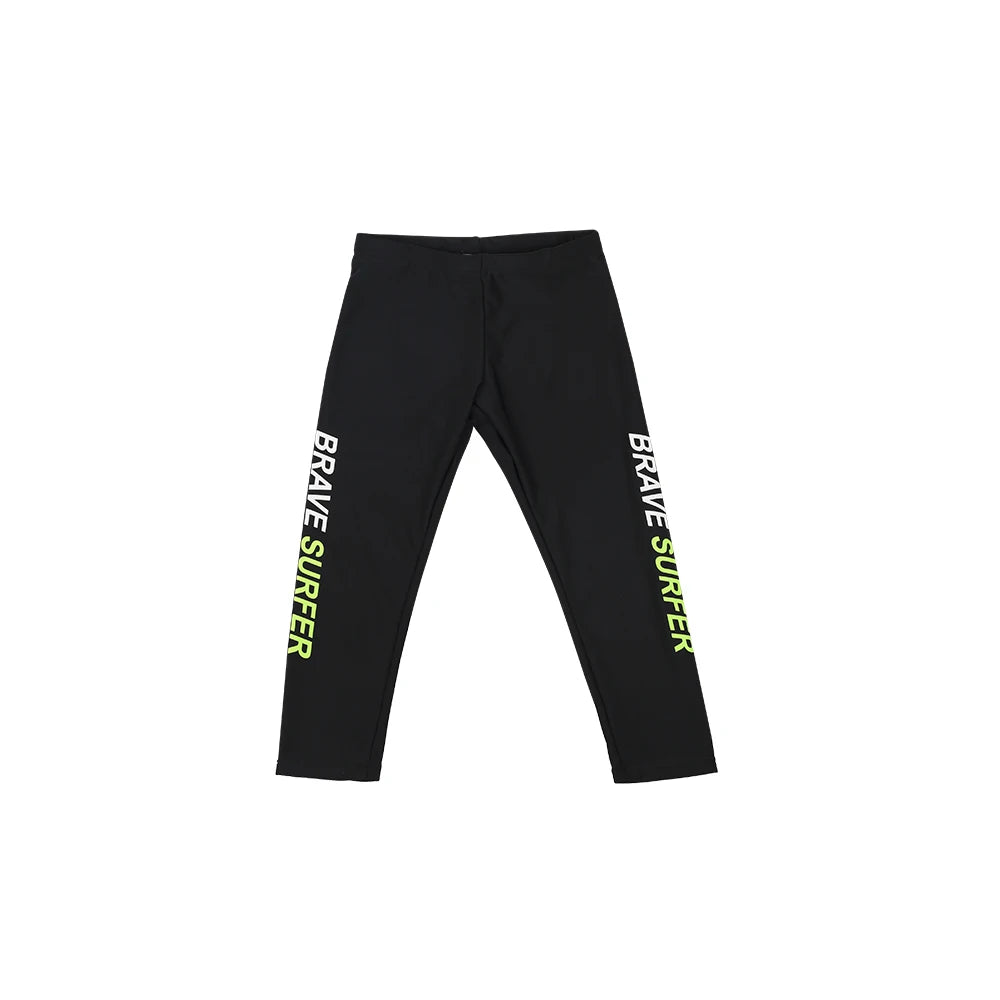 Black leggings with 'Brave Surfer' text on a white background