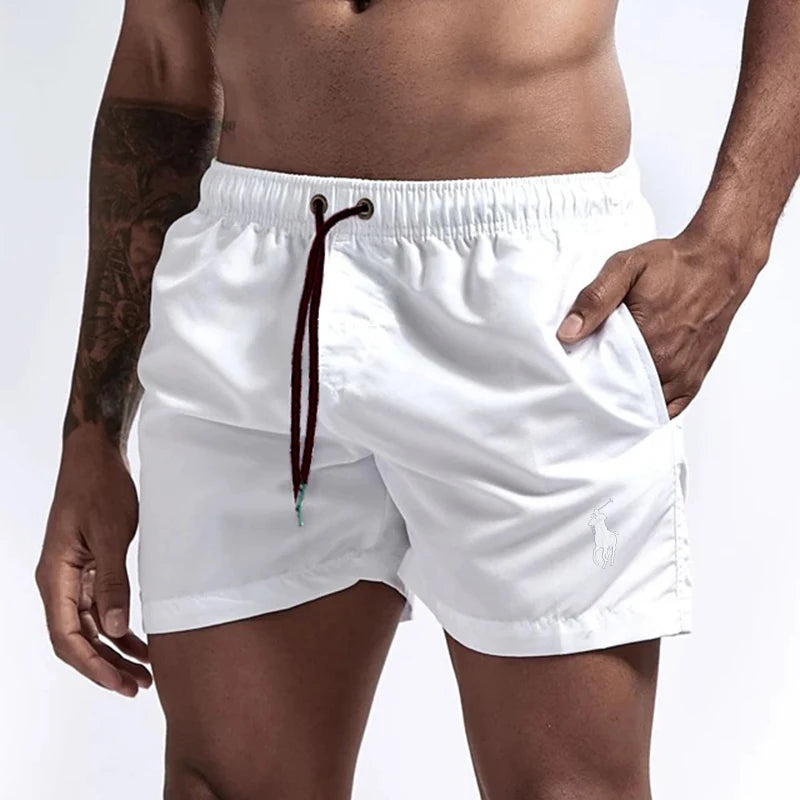 White shorts with a drawstring worn by a person on a white background