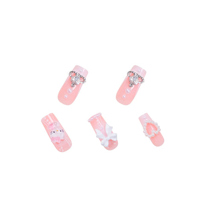 Set of pink nail art designs with decorative elements on a white background