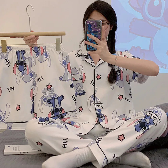 Person wearing a cartoon-themed pajama set taking a selfie.
