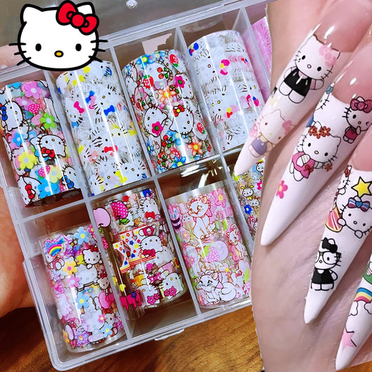 Set of Hello Kitty nail art designs in a clear organizer with a person's hand displaying completed nail art.