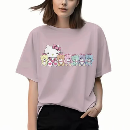 Person wearing a light pink t-shirt with a cartoon character design on a white background