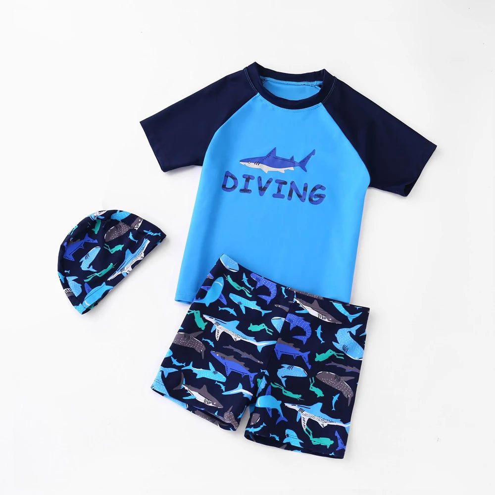 Children's diving outfit with blue shirt, shorts, and cap on a white background