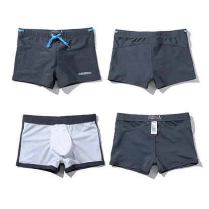Four pairs of men's shorts in different colors on a white background