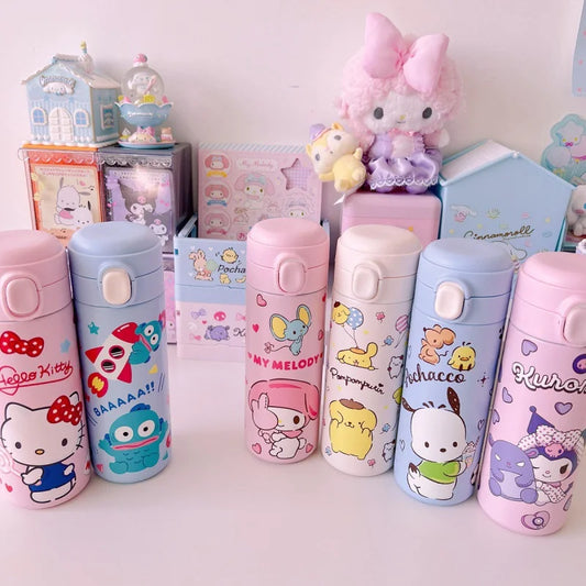 Collection of colorful cartoon-themed water bottles on a white surface with small decorative items in the background.