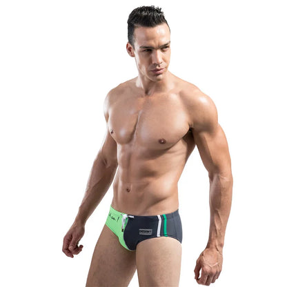 Man wearing a green and black underwear set on a white background