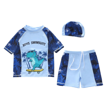 Children's swim set with shirt, shorts, and cap on a white background