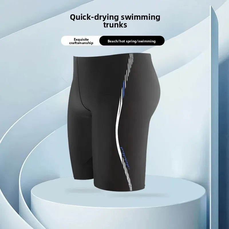 Black swim shorts with a white and blue stripe on a white background